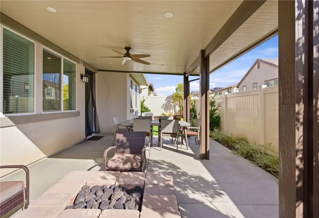 32243 Penstemon Way Temecula, CA 92591 - Photo 22 of 26 a building outdoor space with patio furniture and potted plants
