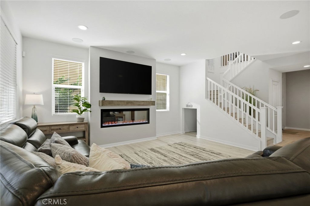 32243 Penstemon Way Temecula, CA 92591 - Photo 8 of 26 a living room with furniture and a flat screen tv