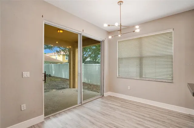 a view of a kitchen from the hallway