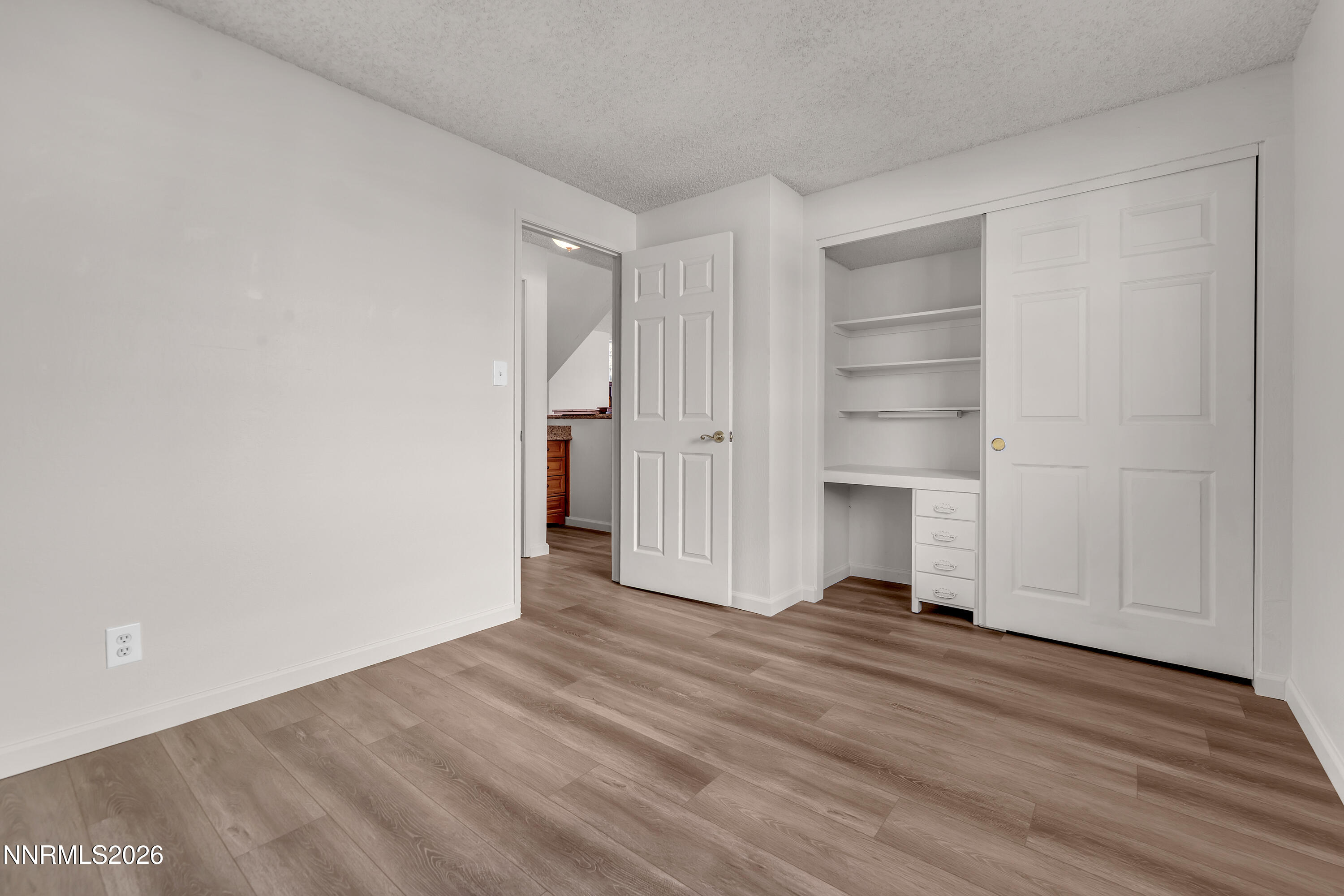 4505 Gorc Way Reno, NV 89502 - Photo 15 of 48 a view of empty room with wooden floor and closet