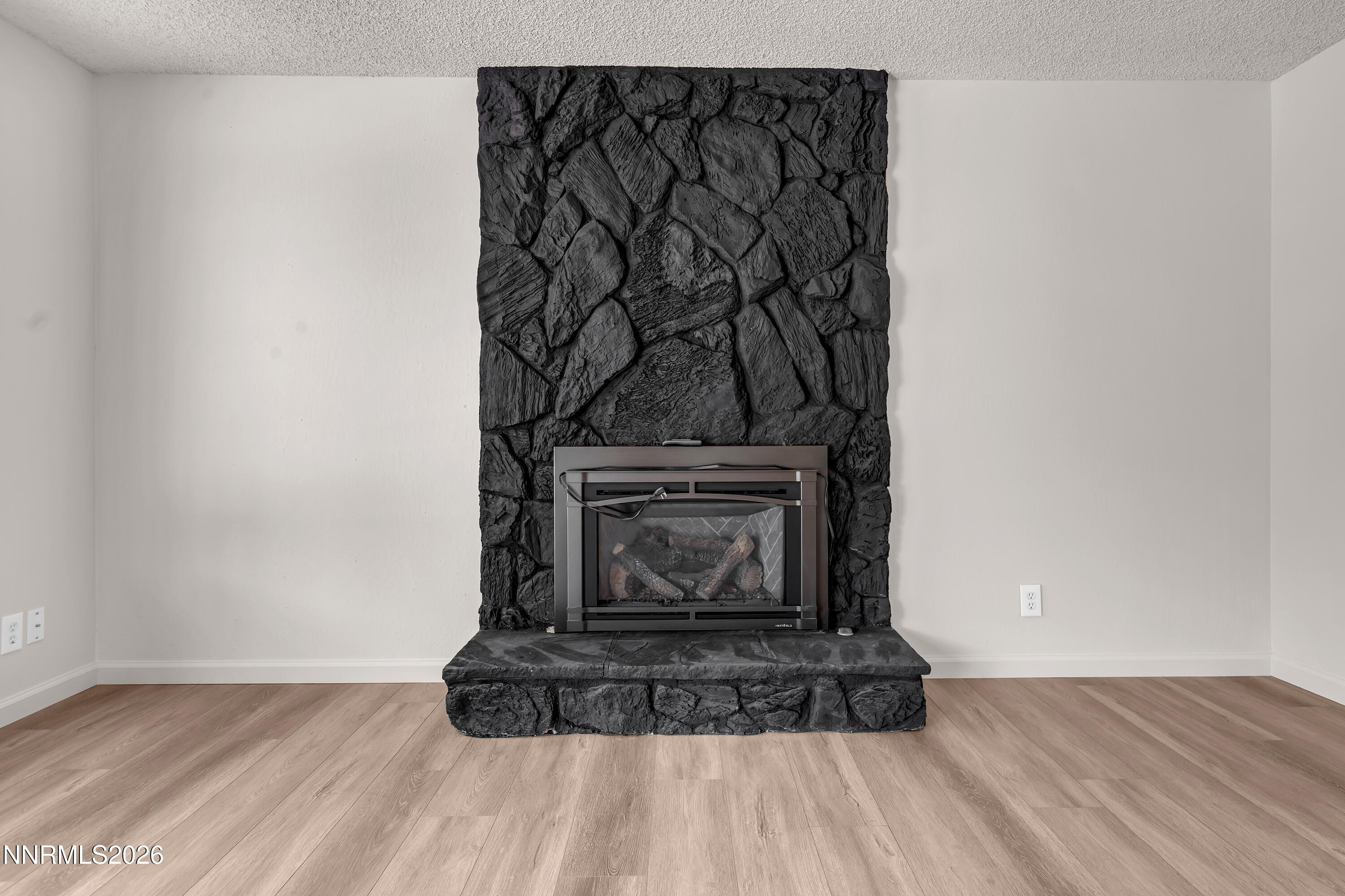 4505 Gorc Way Reno, NV 89502 - Photo 20 of 48 a living room with a fireplace