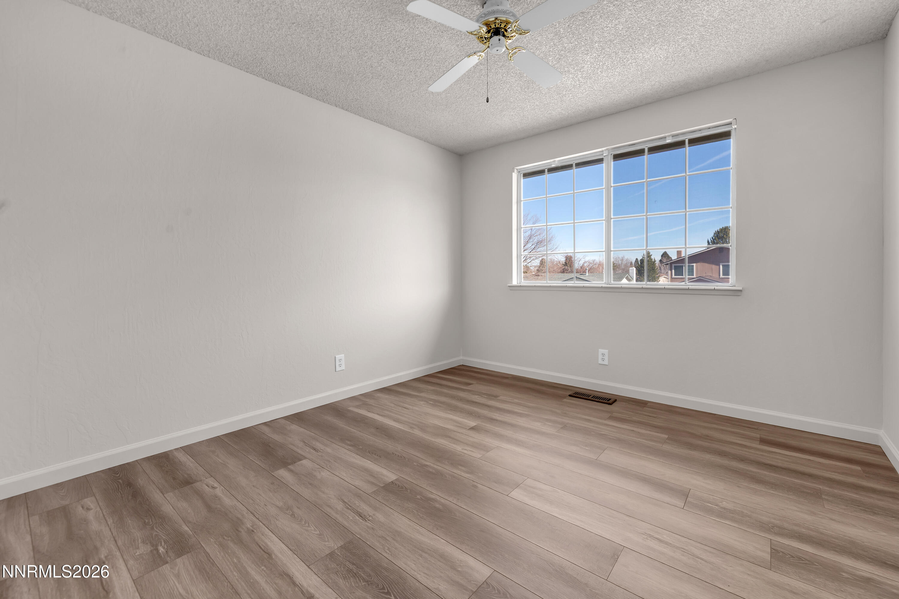 4505 Gorc Way Reno, NV 89502 - Photo 32 of 48 a view of an empty room with a window
