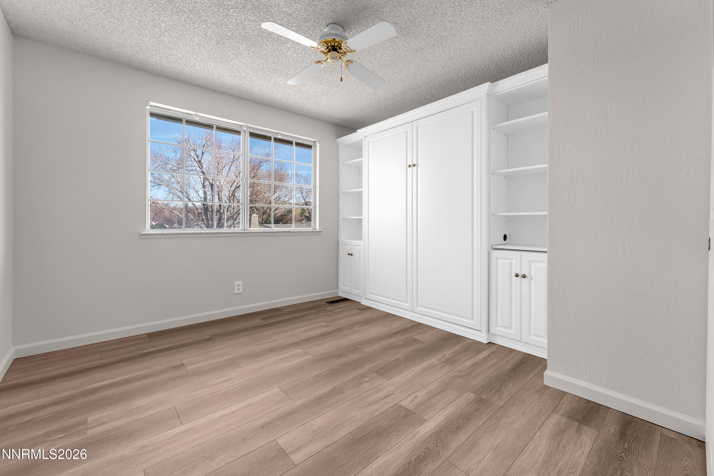 4505 Gorc Way Reno, NV 89502 - Photo 34 of 48 wooden floor in an empty room with a window