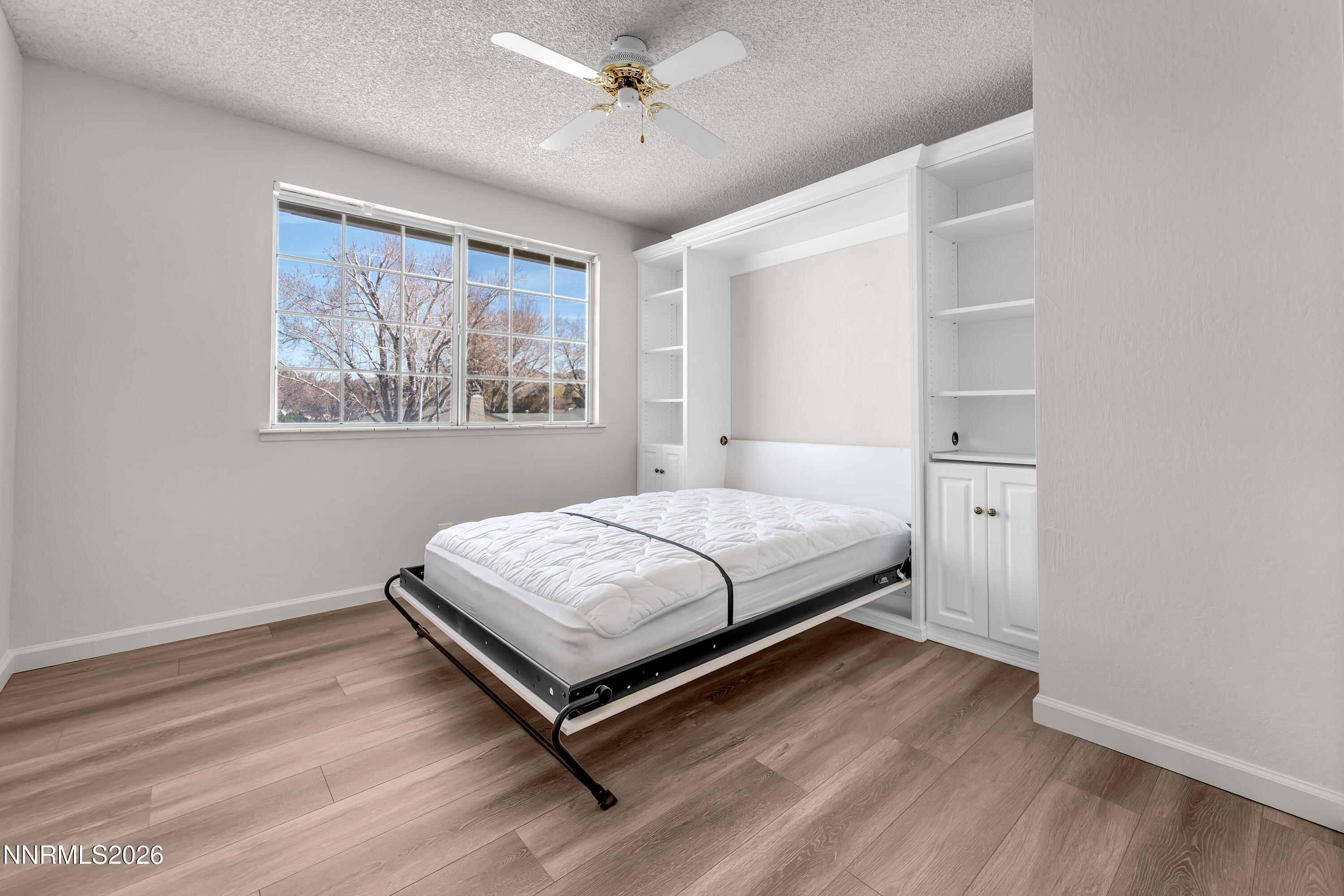 4505 Gorc Way Reno, NV 89502 - Photo 35 of 48 a bedroom with a bed and window