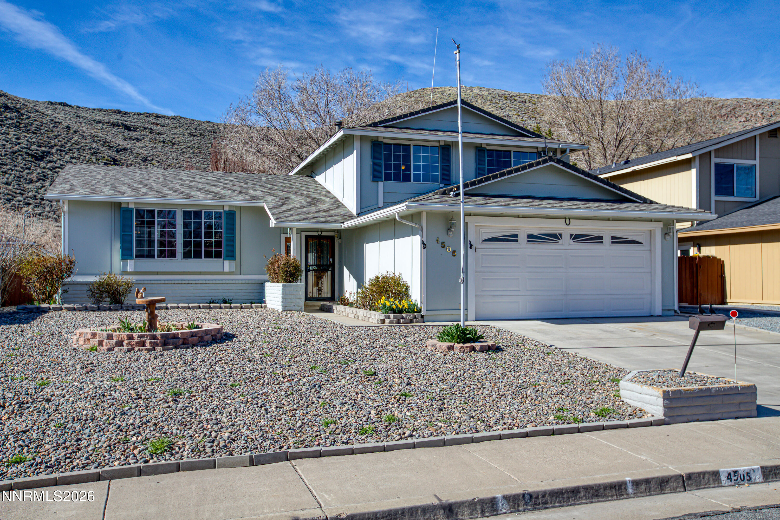 4505 Gorc Way Reno, NV 89502 - Photo 38 of 48 a front view of a house with garden