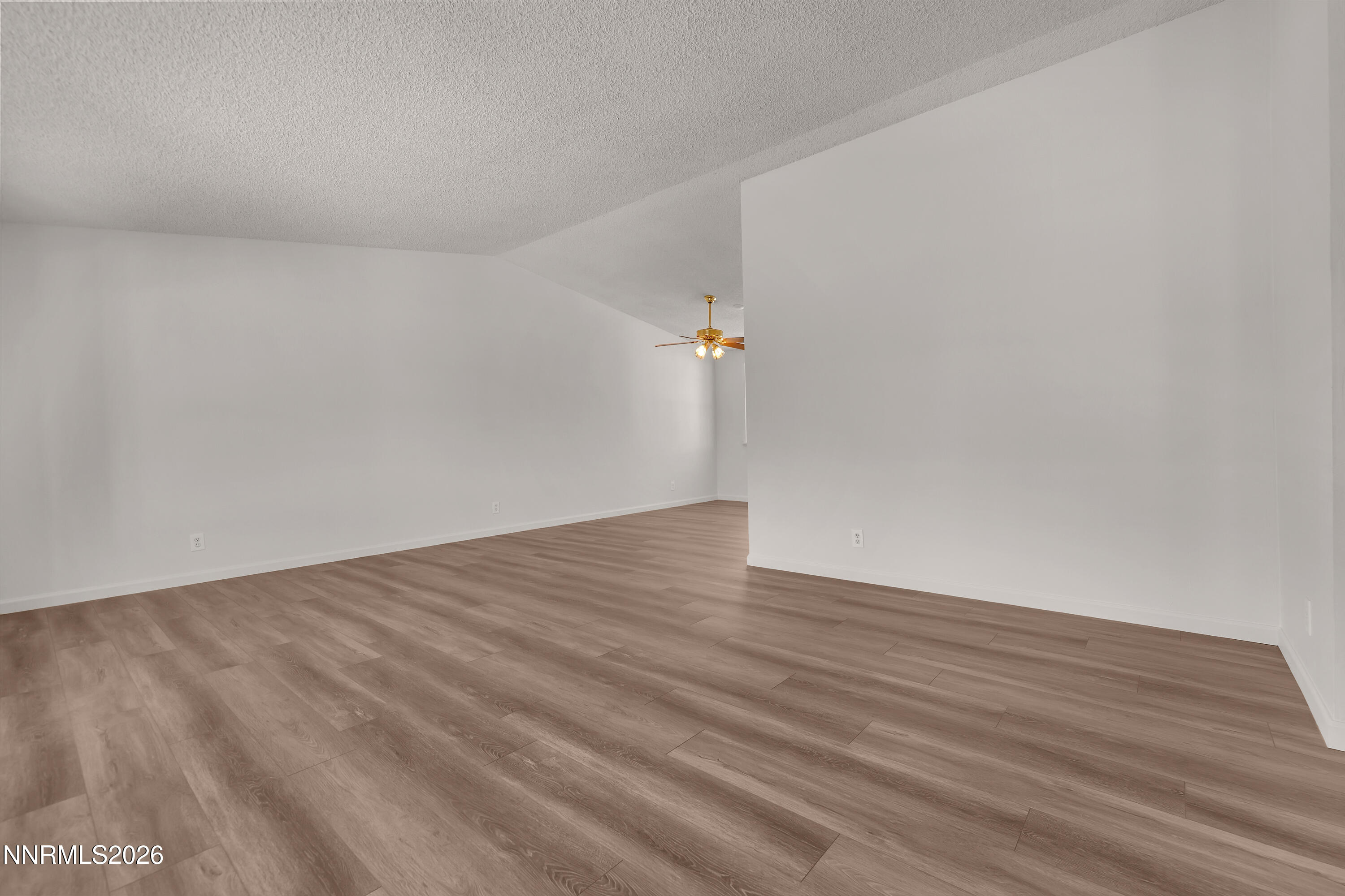 4505 Gorc Way Reno, NV 89502 - Photo 6 of 48 a view of empty room with wooden floor