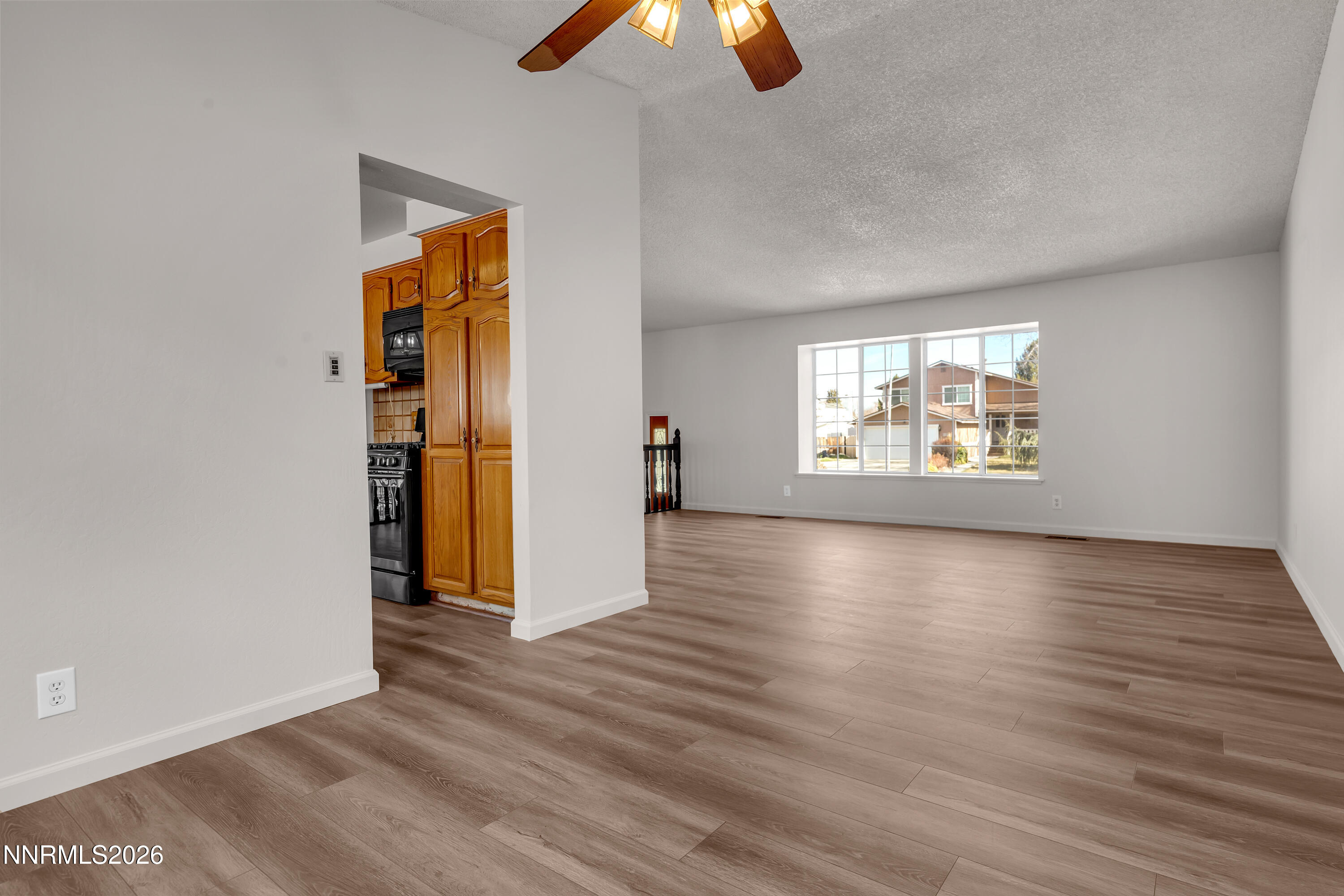 4505 Gorc Way Reno, NV 89502 - Photo 9 of 48 wooden floor in an empty room with a window