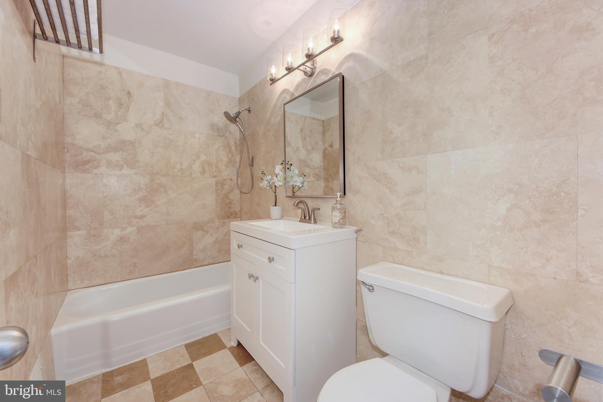 395 O Street Southwest Washington, DC 20024 - Photo 22 of 44 Updated stone bathroom