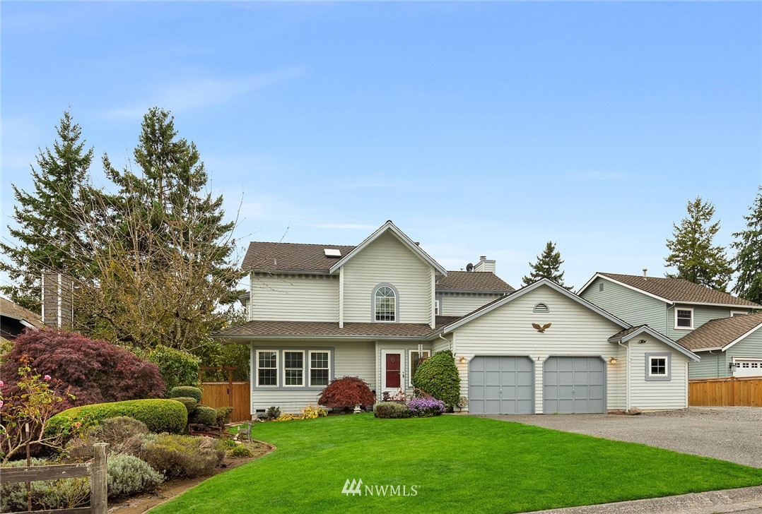 210 237th Place Southwest Bothell, WA 98021 - Photo 1 of 23 a view of a house with a yard porch and sitting area