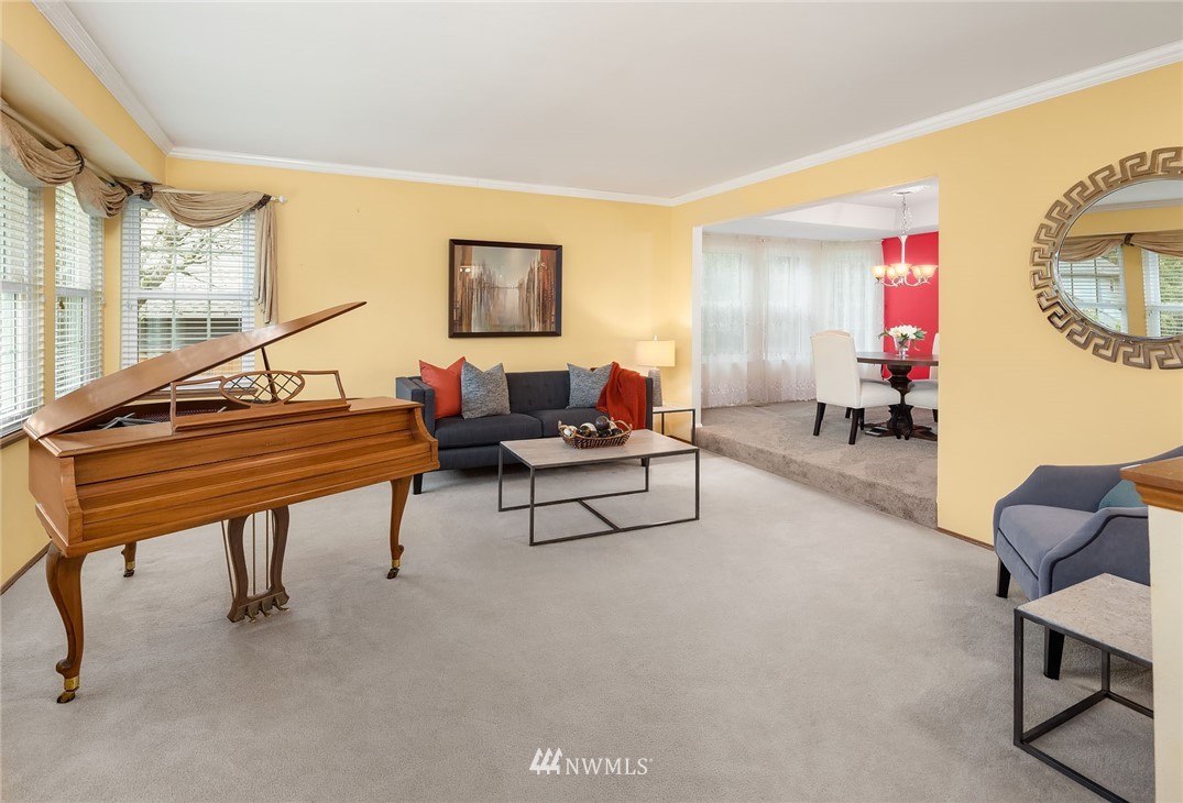 210 237th Place Southwest Bothell, WA 98021 - Photo 3 of 23 a living room with furniture and a wooden floor