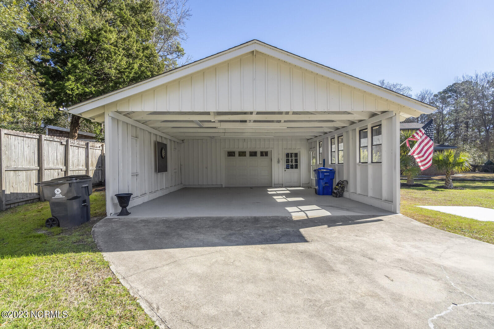 617 Porters Neck Road Wilmington, NC 28411 - Photo 42 of 47 Garage door you see opens into a two car wide garage or shop space. Very clean!