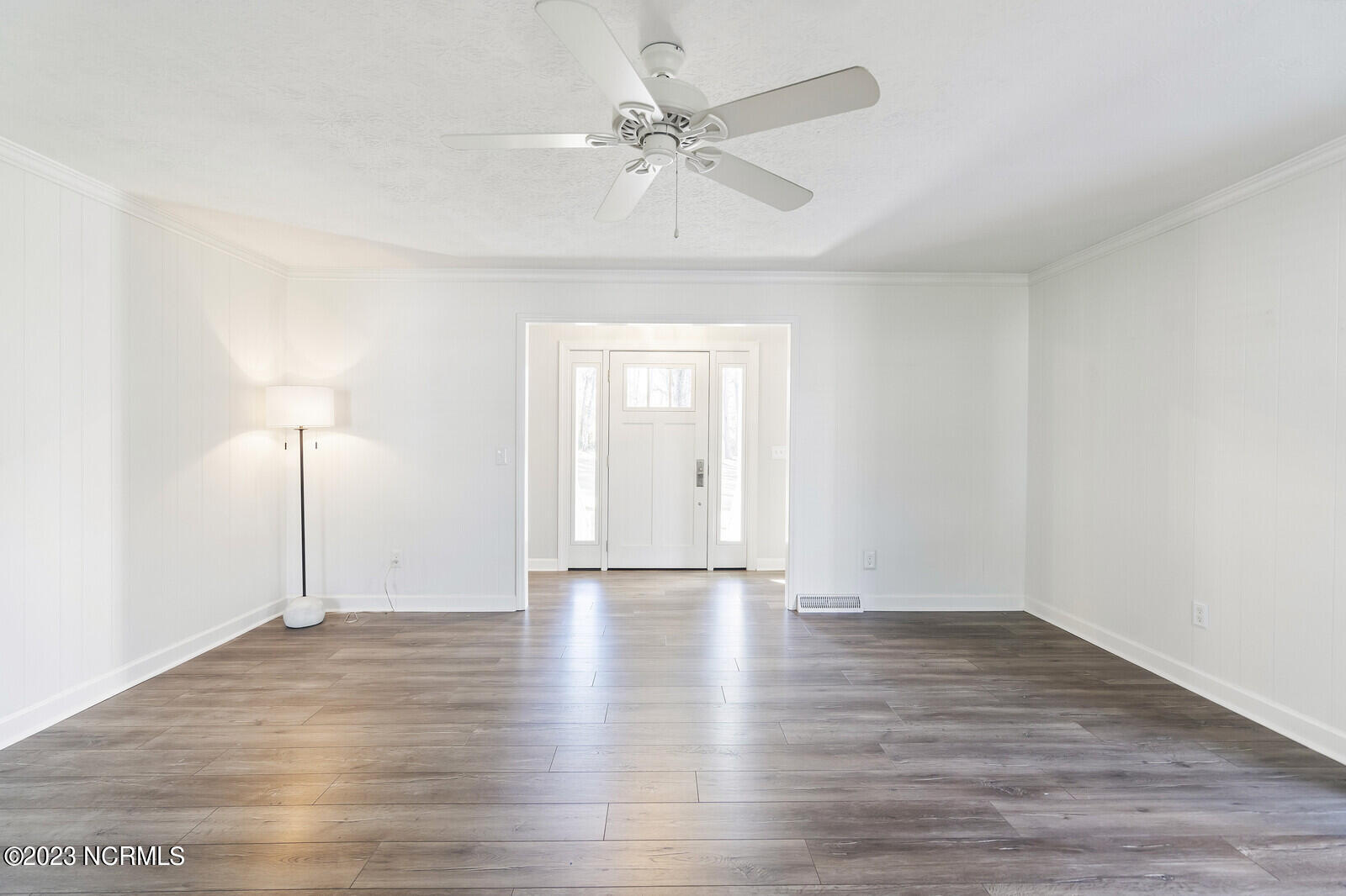 617 Porters Neck Road Wilmington, NC 28411 - Photo 5 of 47 Nice foyer entry into large open living room area with fireplace option (natural gas service) this flows right into the open and airy kitchen