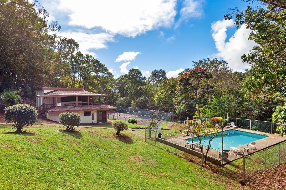 4701 Kawaihau Road, Unit L102 Kapaa, HI 96746 - Photo 21 of 22 a view of a swimming pool with a backyard