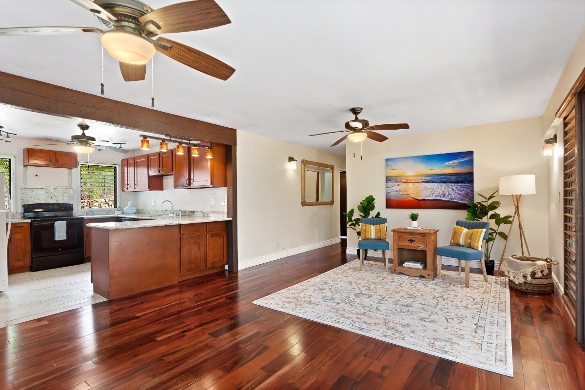 4701 Kawaihau Road, Unit L102 Kapaa, HI 96746 - Photo 6 of 22 a living room with furniture and a flat screen tv
