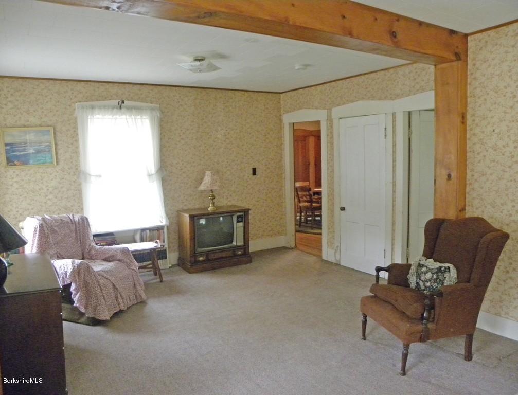 128 North Green River Road Colrain, MA 01340 - Photo 8 of 15 a living room with furniture and a window