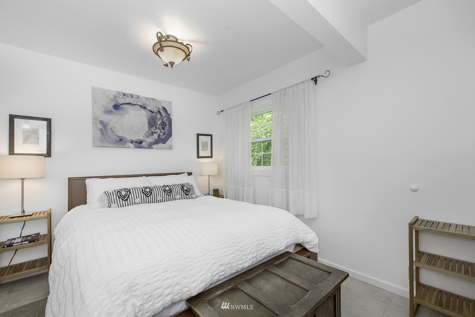 13201 Burma Road Southwest Vashon, WA 98070 - Photo 12 of 31 a bedroom with a bed and a window