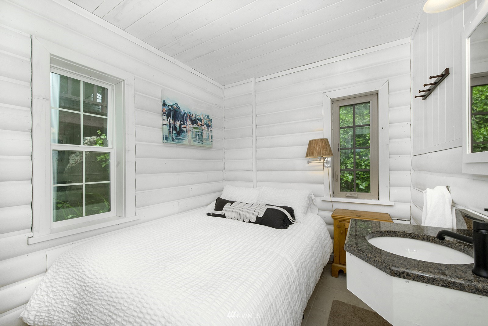 13201 Burma Road Southwest Vashon, WA 98070 - Photo 14 of 31 a bedroom with a bed and a window