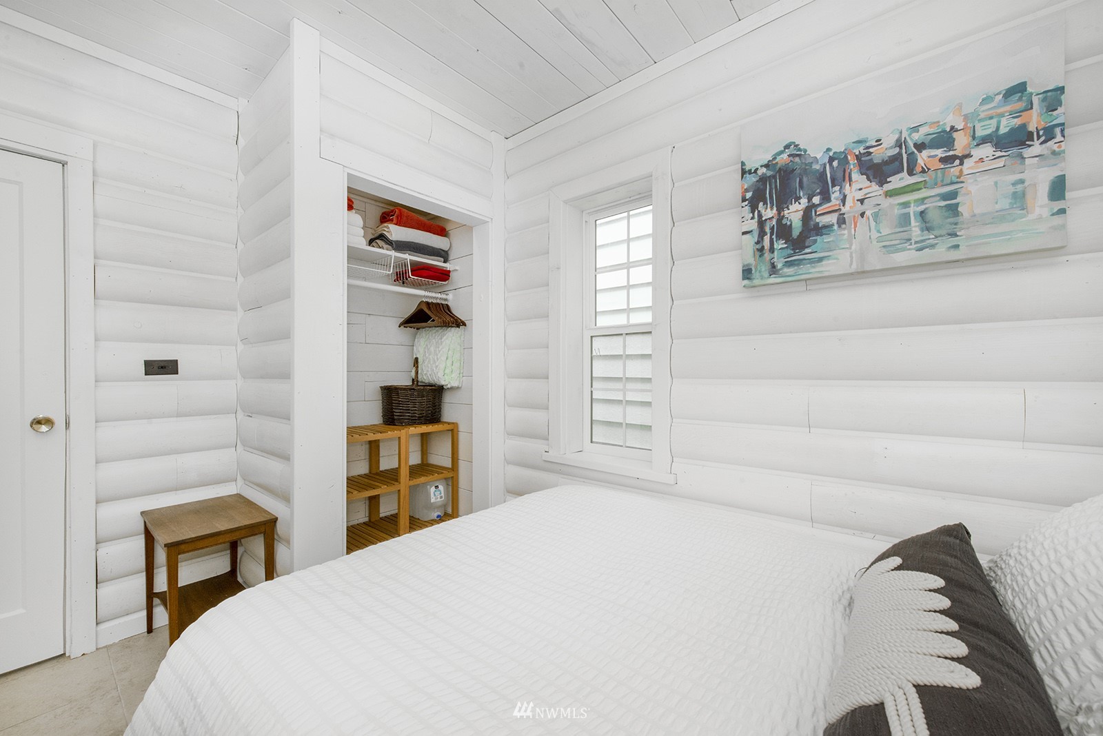 13201 Burma Road Southwest Vashon, WA 98070 - Photo 15 of 31 a bedroom with a bed and a closet