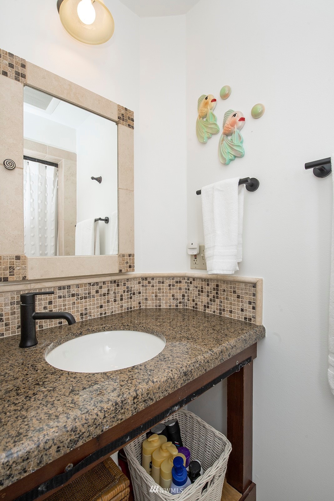 13201 Burma Road Southwest Vashon, WA 98070 - Photo 16 of 31 a bathroom with a granite countertop sink and a mirror