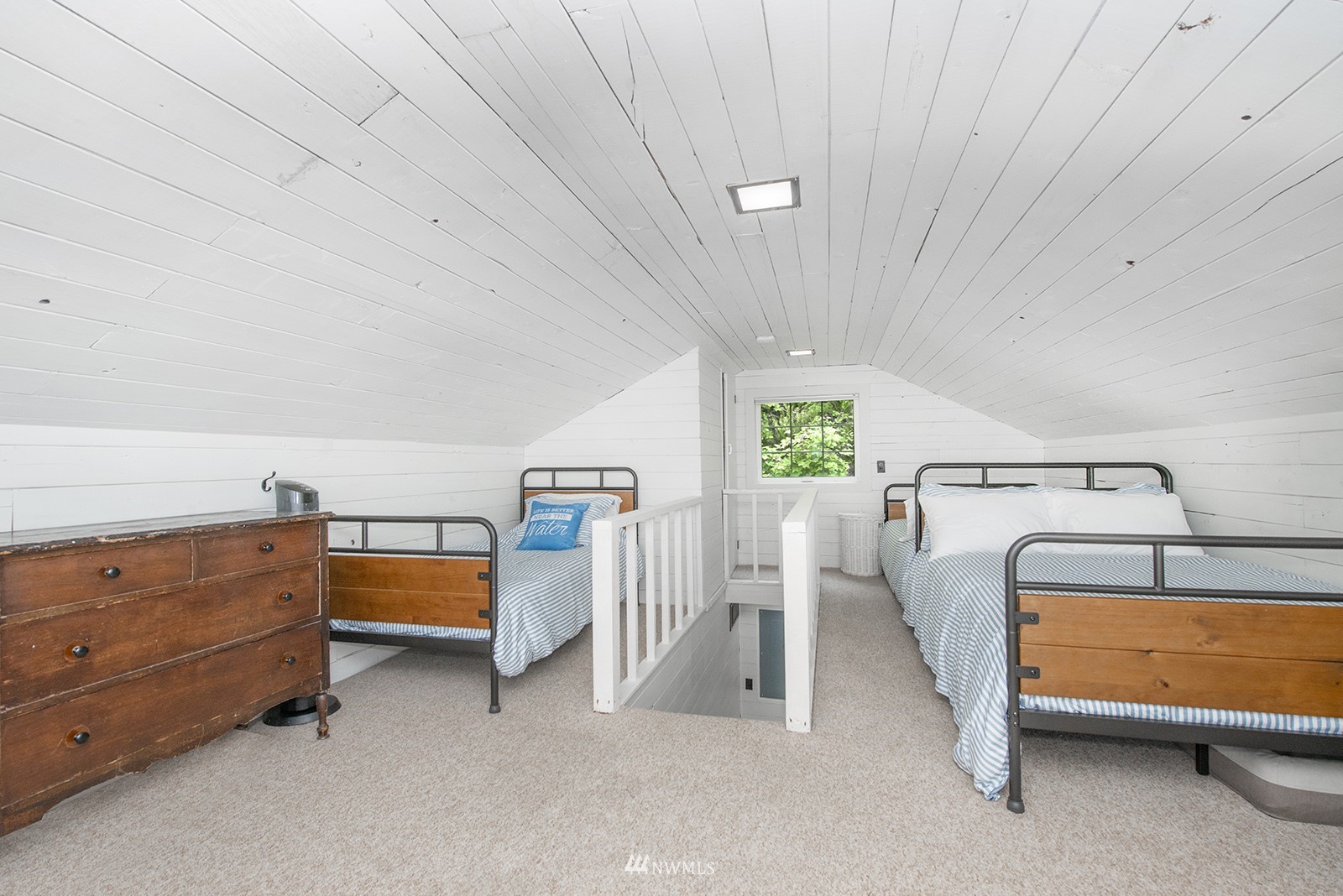 13201 Burma Road Southwest Vashon, WA 98070 - Photo 19 of 31 a bedroom with furniture and window