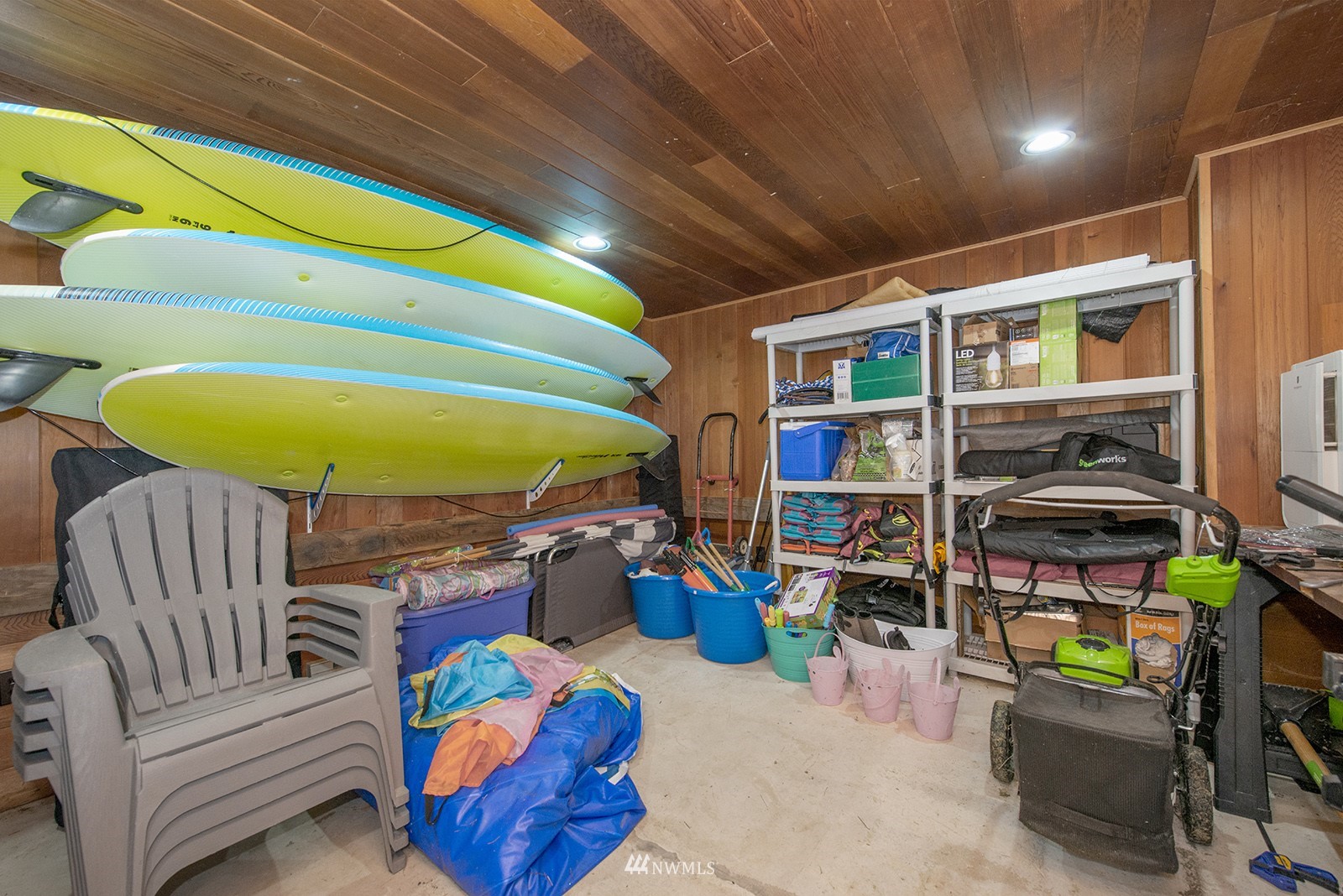 13201 Burma Road Southwest Vashon, WA 98070 - Photo 21 of 31 a living room with furniture and a floor to ceiling window