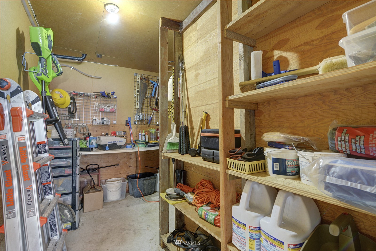 13201 Burma Road Southwest Vashon, WA 98070 - Photo 23 of 31 a room with furniture a rug and a window