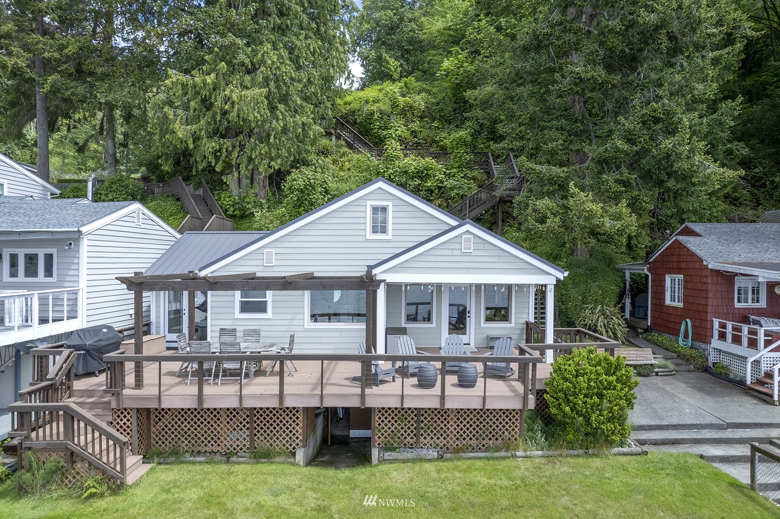 13201 Burma Road Southwest Vashon, WA 98070 - Photo 28 of 31 a view of a house with a yard and sitting area