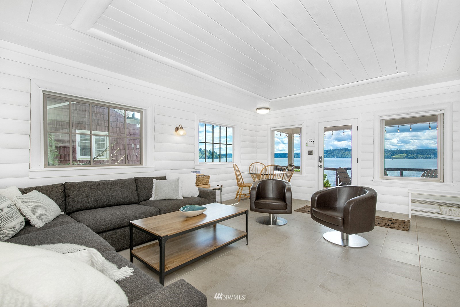 13201 Burma Road Southwest Vashon, WA 98070 - Photo 4 of 31 a living room with furniture and a window