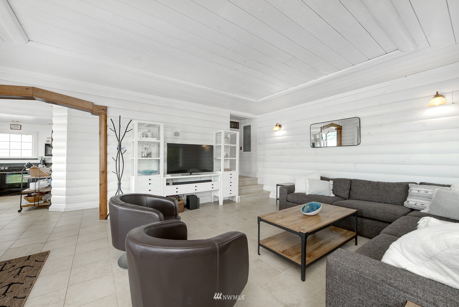 13201 Burma Road Southwest Vashon, WA 98070 - Photo 5 of 31 a living room with furniture and a flat screen tv