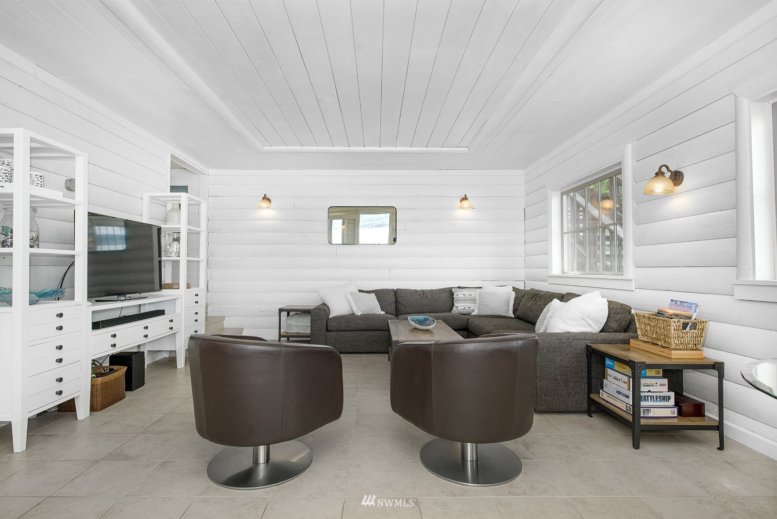 13201 Burma Road Southwest Vashon, WA 98070 - Photo 6 of 31 a living room with furniture and a flat screen tv