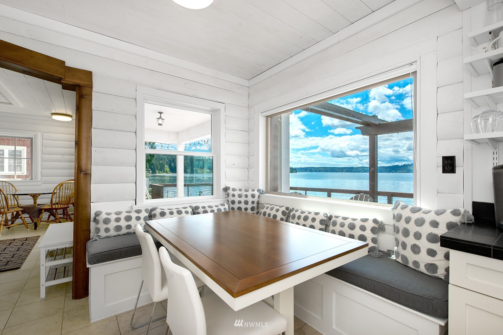 13201 Burma Road Southwest Vashon, WA 98070 - Photo 8 of 31 a living room with large window and table