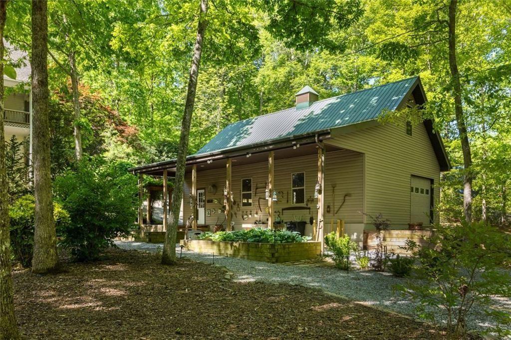 704 Riverbend Road Blairsville, GA 30512 - Photo 21 of 89 front view of a house with a yard