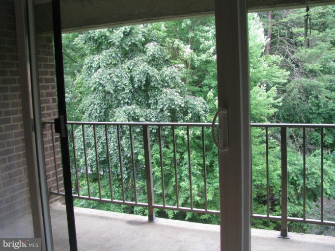 1427 Northgate Square, Unit 27/32B Reston, VA 20190 - Photo 15 of 19 Balcony - view of trees