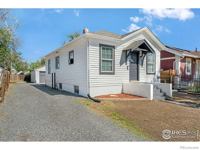a view of the house with a patio