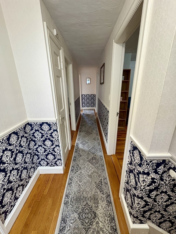 71 Morningside Road Worcester, MA 01602 - Photo 18 of 42 view of a hallway with wooden floor