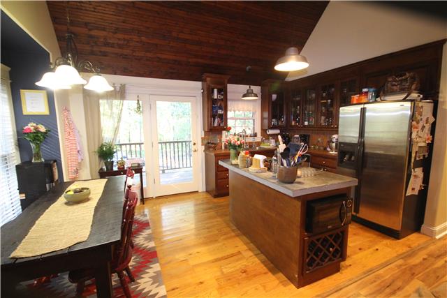 6188 Highway 161 Springfield, TN 37172 - Photo 3 of 14 Eat in kitchen with neat concrete countertop on island!