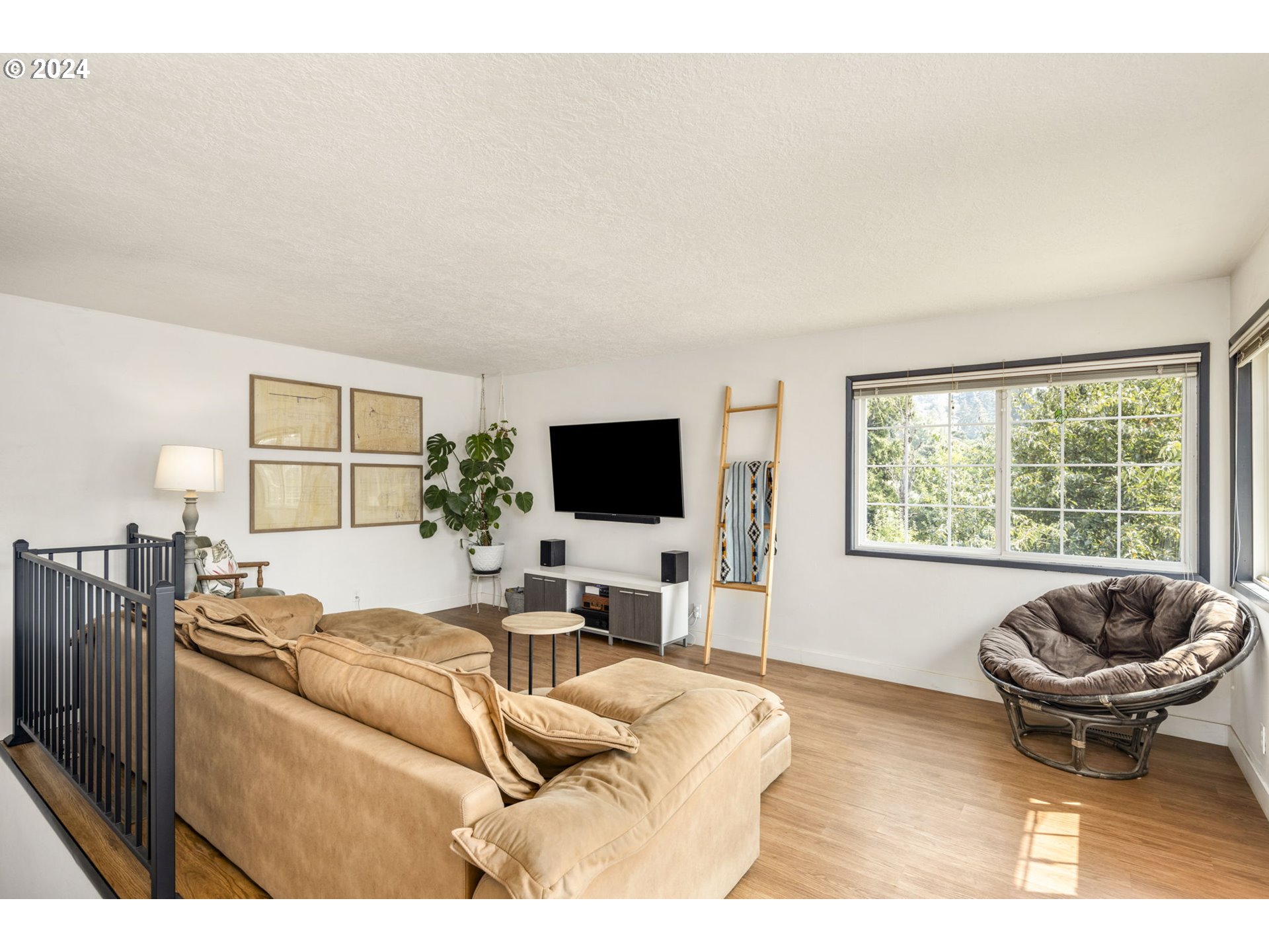 13762 Southeast Wiese Road Damascus, OR 97089 - Photo 15 of 44 a living room with furniture and a flat screen tv