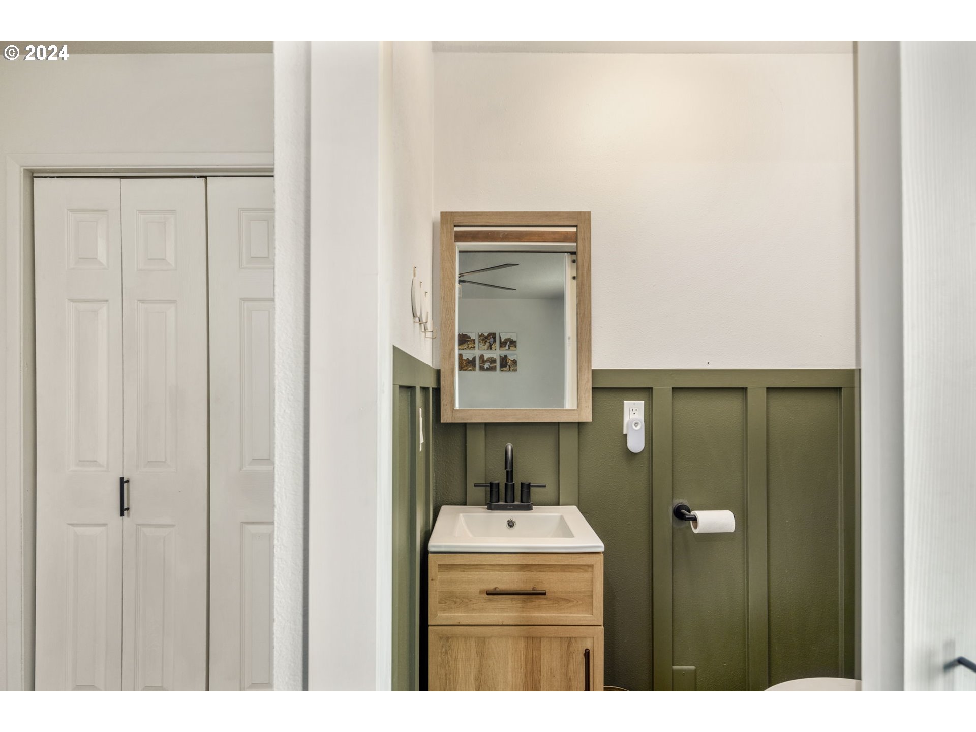 13762 Southeast Wiese Road Damascus, OR 97089 - Photo 19 of 44 a bathroom with a sink a mirror and a toilet