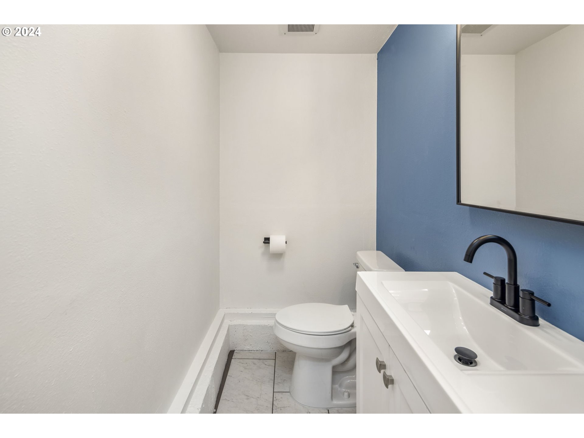 13762 Southeast Wiese Road Damascus, OR 97089 - Photo 27 of 44 a bathroom with a sink and a toilet