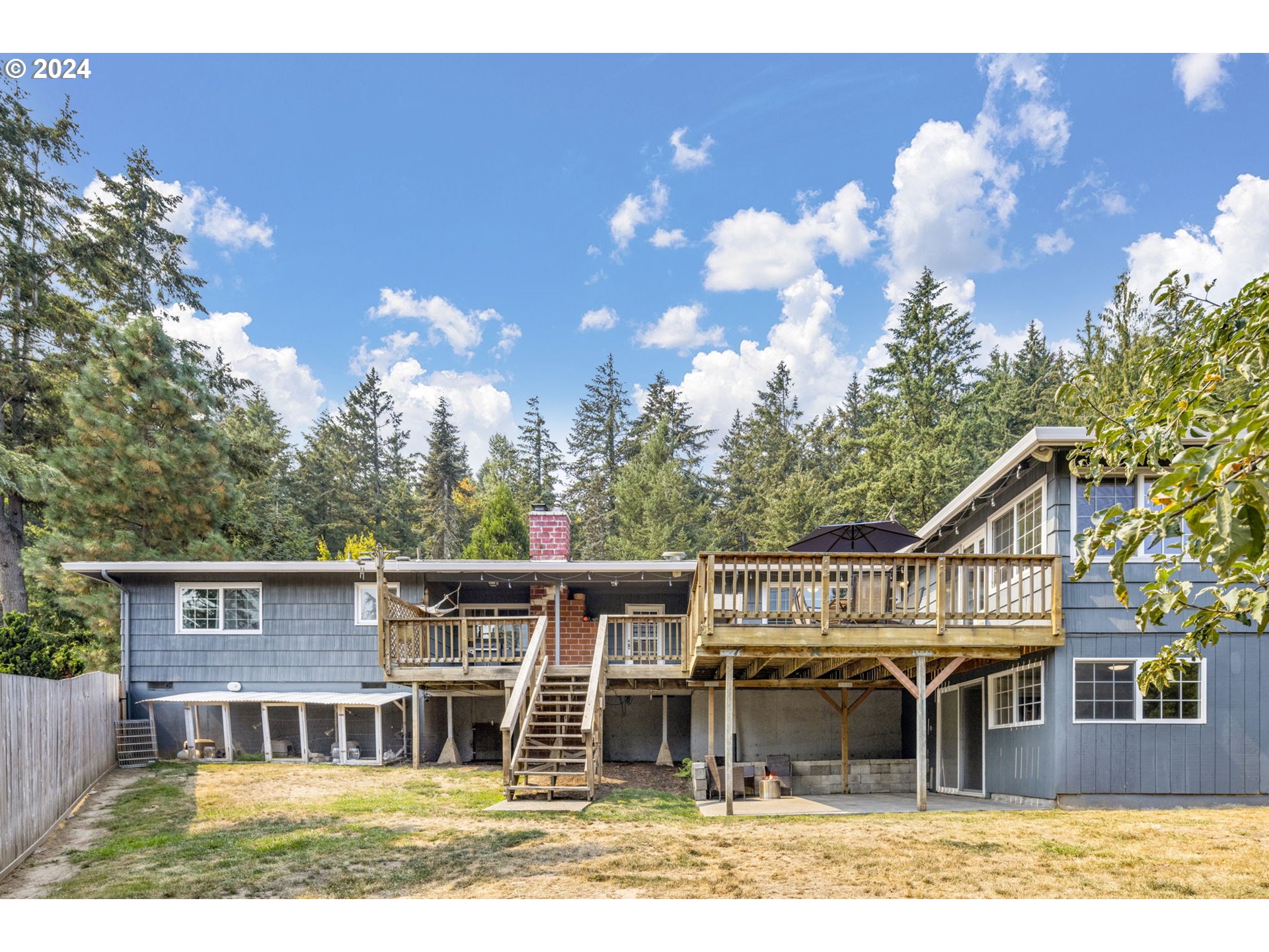 13762 Southeast Wiese Road Damascus, OR 97089 - Photo 31 of 44 a view of a house with a yard