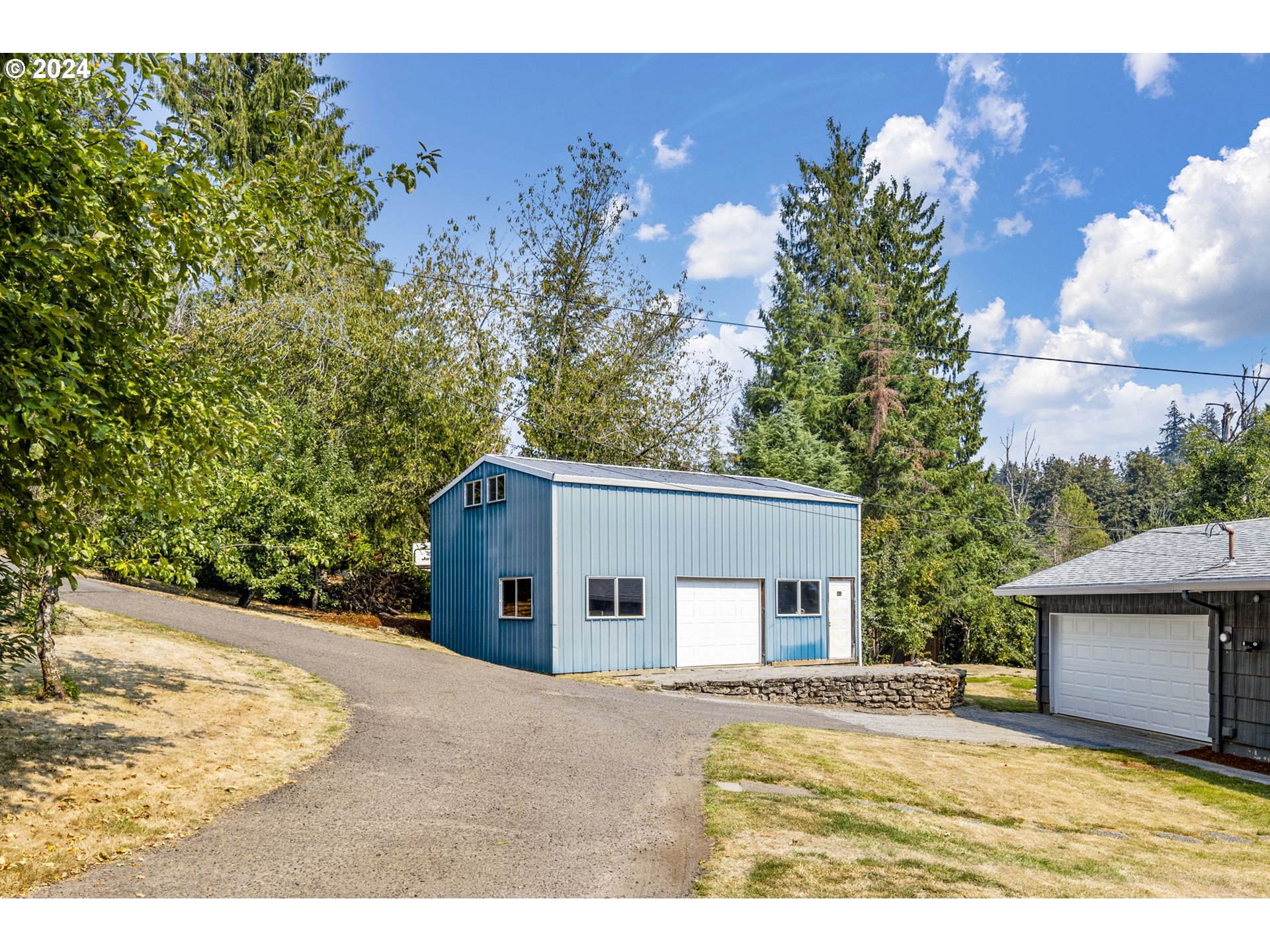 13762 Southeast Wiese Road Damascus, OR 97089 - Photo 4 of 44 a view of a house with a yard