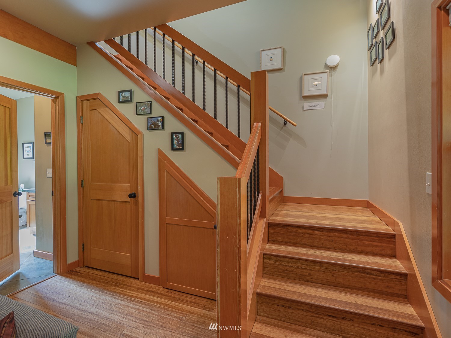 1864 Lost Mountain Road Sequim, WA 98382 - Photo 11 of 35 a view of entryway with wooden floor and stairs