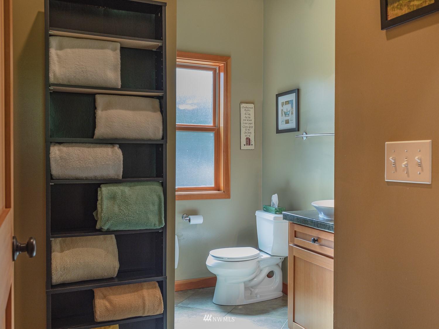 1864 Lost Mountain Road Sequim, WA 98382 - Photo 12 of 35 a bathroom with a toilet and a sink