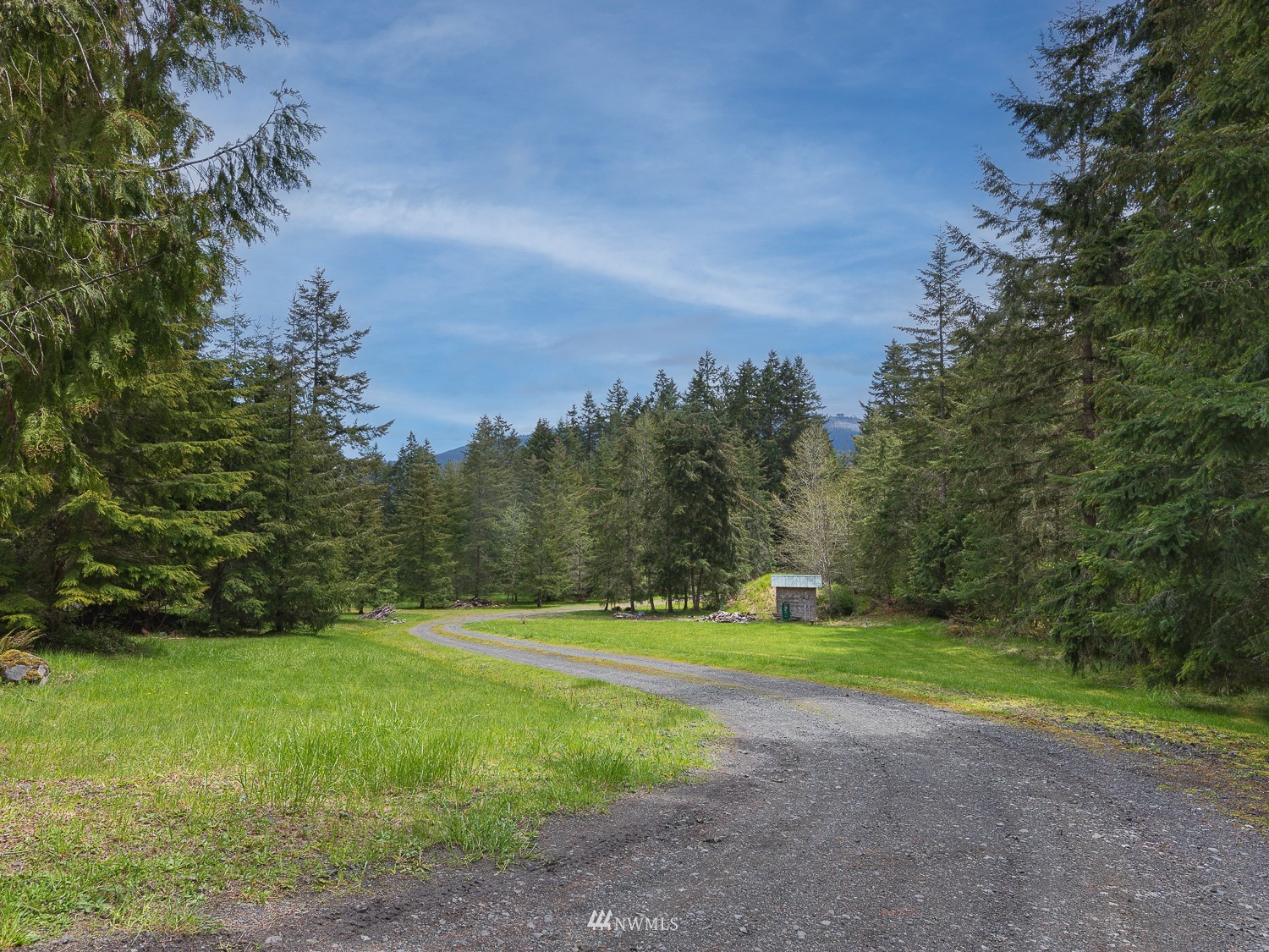 1864 Lost Mountain Road Sequim, WA 98382 - Photo 26 of 35 a view of a golf course with a yard