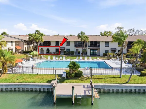 $349,999 | 507 Plaza Seville Court, Unit 13, Treasure Island, FL 33706