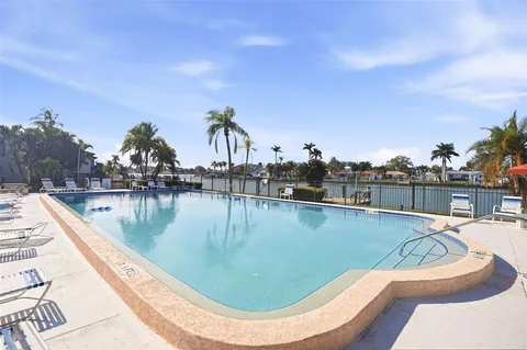 $349,999 | 507 Plaza Seville Court, Unit 13, Treasure Island, FL 33706