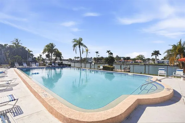 $349,999 | 507 Plaza Seville Court, Unit 13, Treasure Island, FL 33706