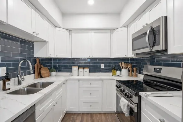 $349,999 | 507 Plaza Seville Court, Unit 13, Treasure Island, FL 33706