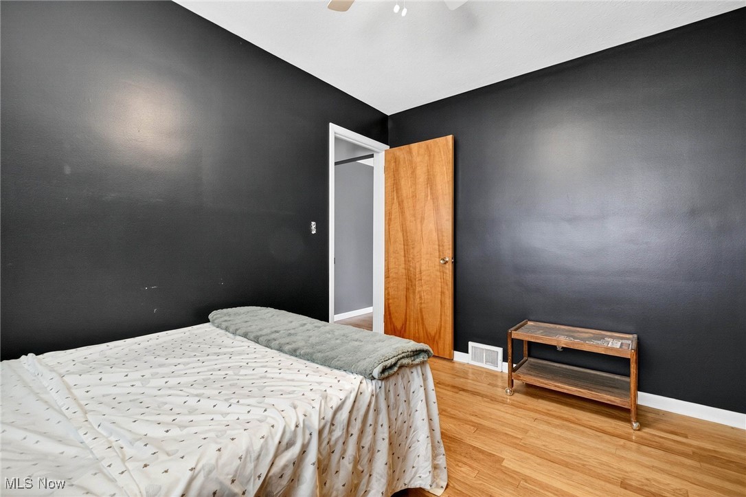 30112 Barjode Road Willowick, OH 44095 - Photo 16 of 28 Bedroom featuring wood finished floors and a ceiling fan