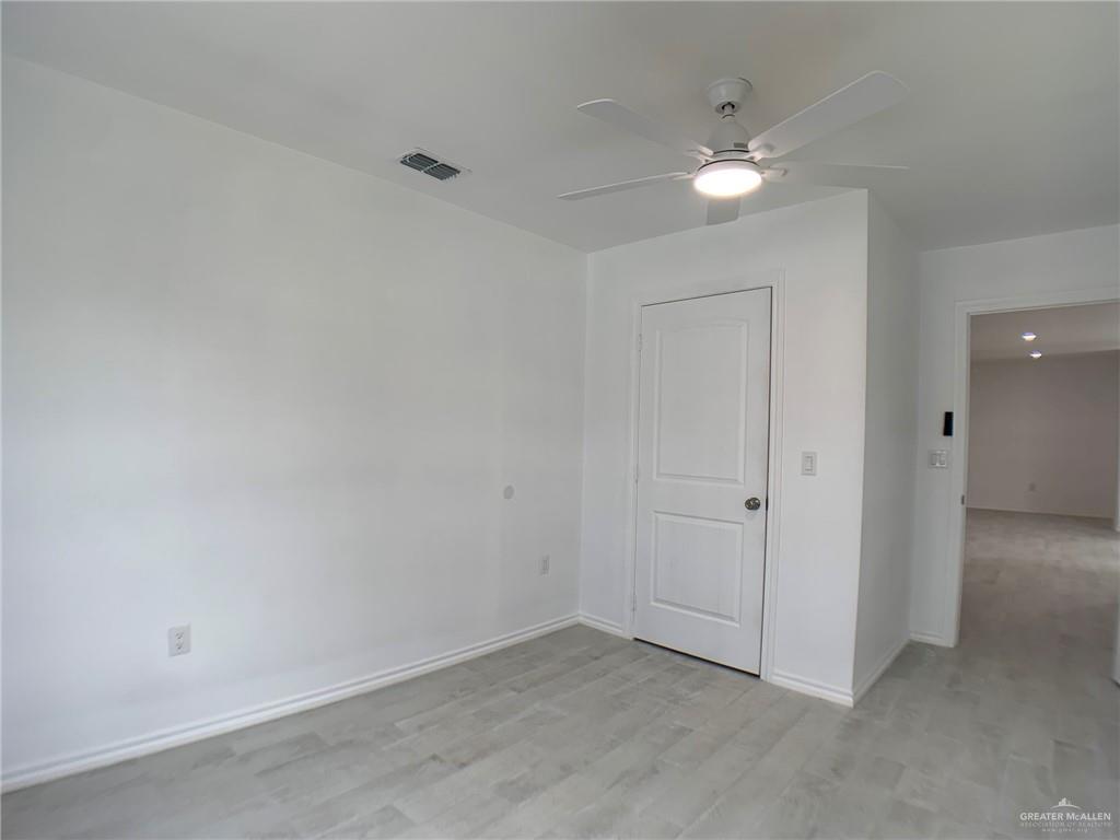 10824 Compadres Street Mercedes, TX 78570 - Photo 11 of 19 a view of an empty room